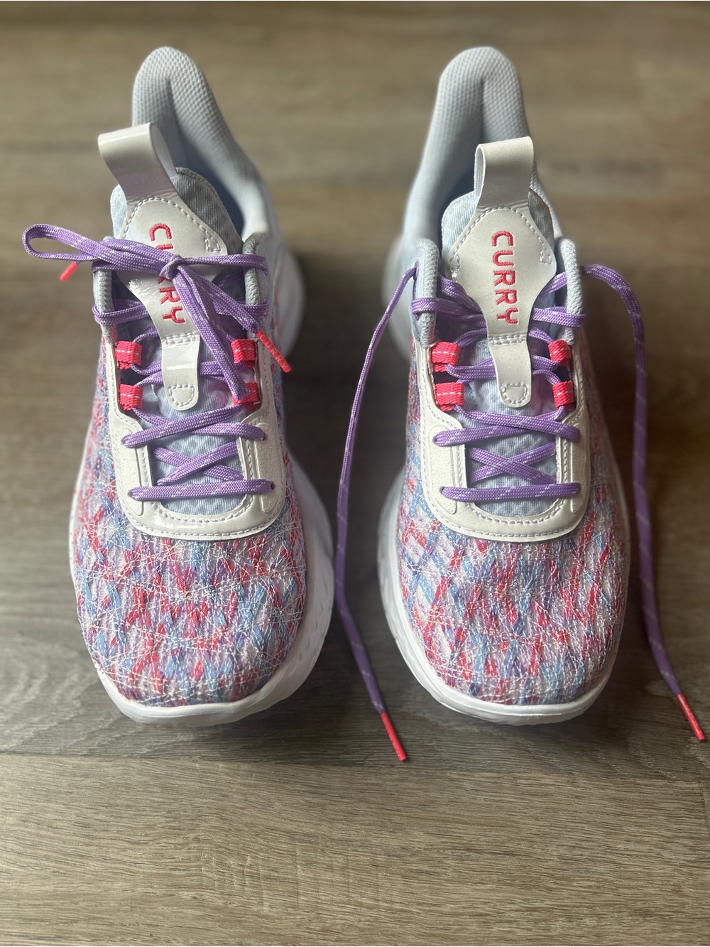Under Armour Curry Flow Unisex Multicolor Knit Sneakers with Purple Laces.